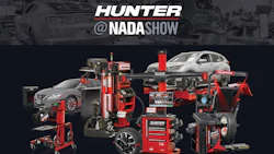 Hunter automotive equipment display with wheel balancers, lifts, and service tools at NADA Show