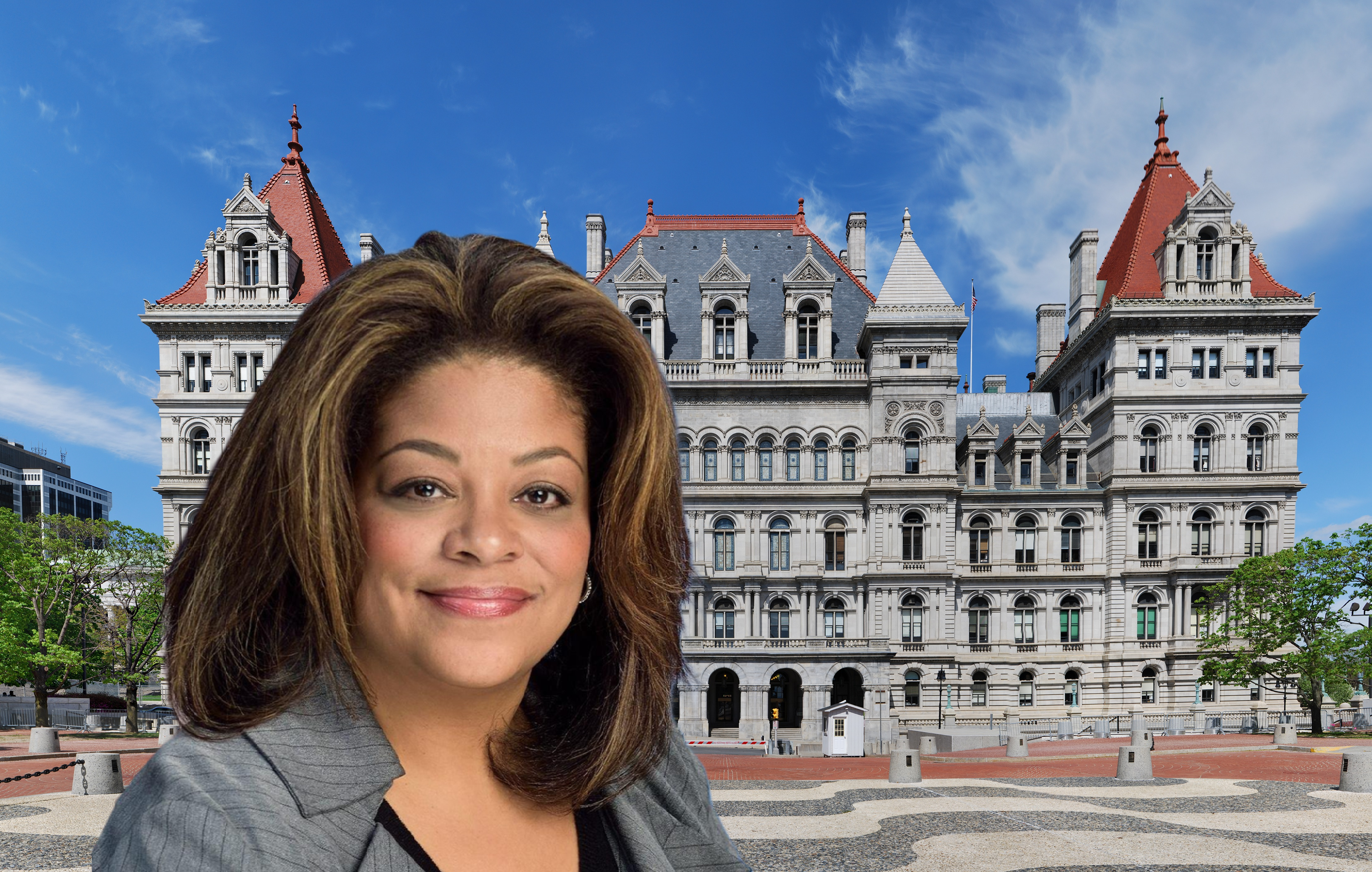 Professional woman in gray suit at New York State Capitol building in Albany
