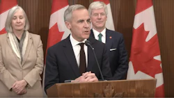 Canadian government press conference with three officials at podium with national flags