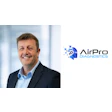 AirPro Diagnostics corporate logo with smiling professional in business attire