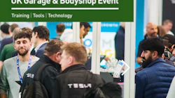 UK Garage & Bodyshop Event with professionals networking at trade show