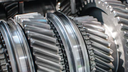 Close-up of interlocking metal gears in industrial machinery transmission system