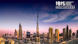 IBIS Middle East 2026 International Bodyshop Industry Symposium logo displayed over Dubai skyline at sunset