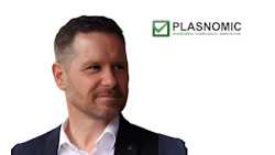 Professional man in business attire with Plasnomic standards compliance innovation logo
