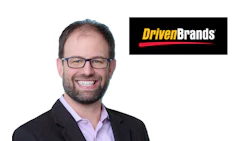 Driven Brands corporate logo in yellow and black with professional headshot