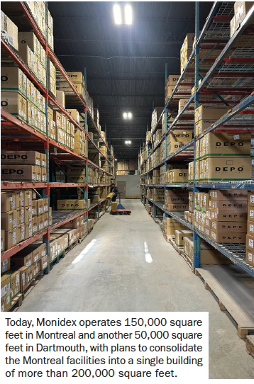 Warehouse interior with tall shelves stacked with cardboard boxes in storage facility