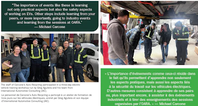 Electric vehicle training workshop with team of automotive professionals