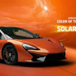 Orange McLaren sports car showcasing Axalta's 2026 Global Automotive Color of the Year Solar Boost