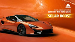 Orange McLaren sports car showcasing Axalta's 2026 Global Automotive Color of the Year Solar Boost
