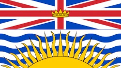 British Columbia provincial flag featuring Union Jack design with rising sun symbol in gold and blue