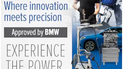 CAR-O-LINER automotive diagnostic equipment advertisement featuring BMW approval and technician demonstration