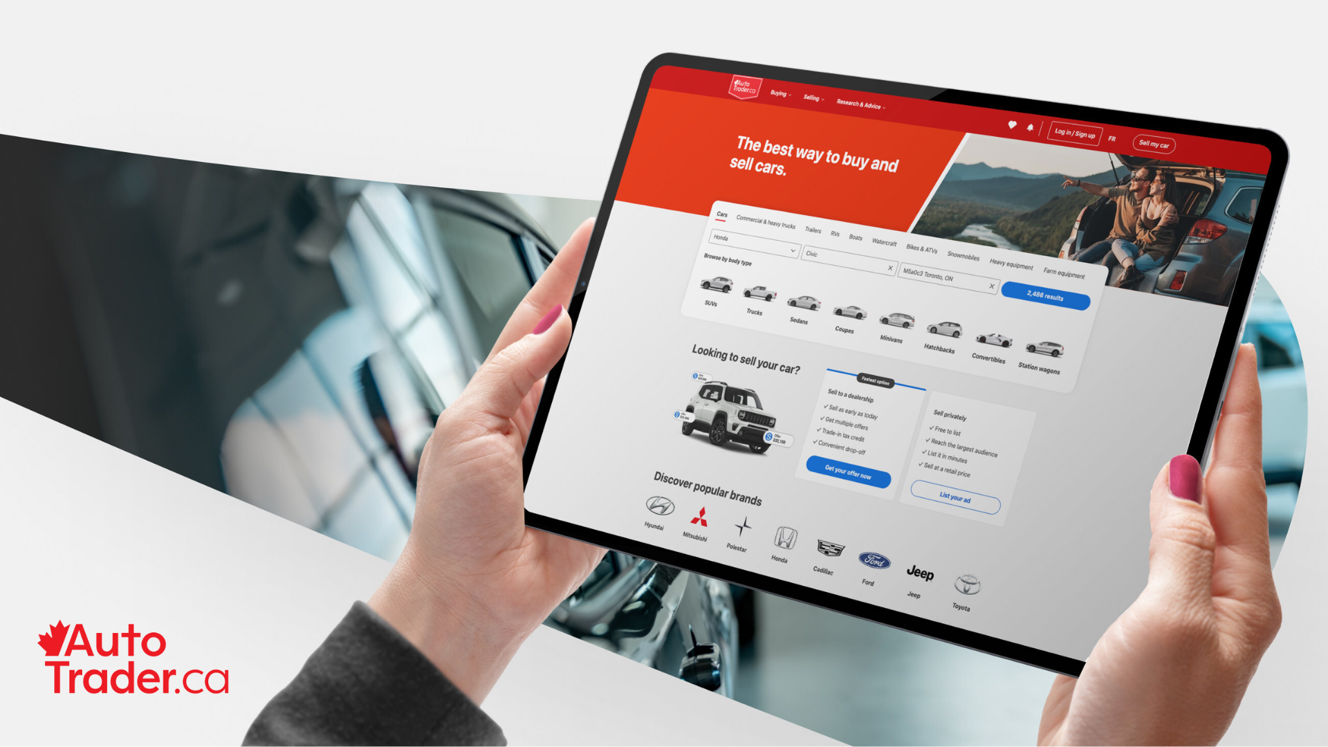 AutoTrader.ca website displayed on tablet showing vehicle listings and buying options with red banner header