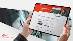 AutoTrader.ca website displayed on tablet showing vehicle listings and buying options with red banner header