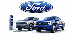 Ford electric truck lineup with charging station and company logo