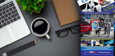 EV Repair Magazine cover on desk with laptop, coffee, notebook, and office supplies