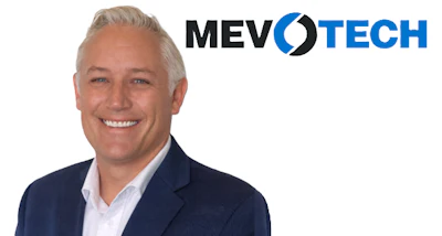 Professional headshot of smiling man in navy blazer with MEVOTECH logo