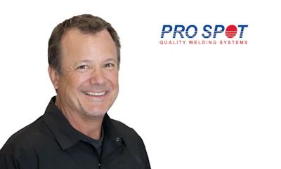 Professional headshot of smiling man in black polo shirt with Pro Spot Quality Welding Systems logo