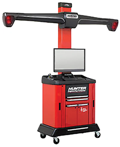 Hunter wheel alignment machine with red base, black measurement arms, and digital display monitor
