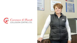 Carmen & Frank Collision Centre Ltd. logo with woman in black vest standing in office