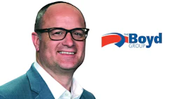 Professional man in glasses and blue blazer with The Boyd Group logo featuring red and blue swoosh design
