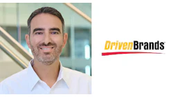 Driven Brands logo with yellow and black text and red underline accent