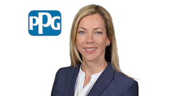 Professional woman in navy blazer with PPG Industries logo