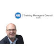 ASE Training Managers Council logo featuring blue gear symbol with organization name and ATMC acronym