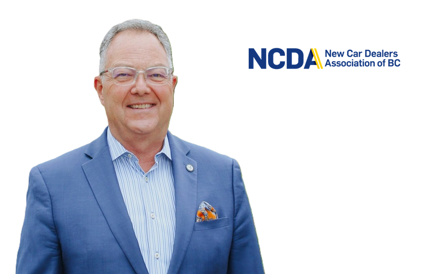 Professional headshot of man in blue blazer and striped shirt with NCDA New Car Dealers Association of BC logo