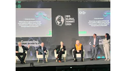 IBIS Global Summit 2024 panel discussion with five speakers seated on stage discussing changemakers in collision repair industry