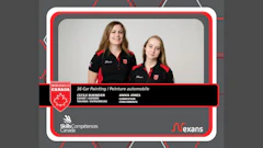 Two female professionals in black and red uniforms representing Canada at WorldSkills car painting competition