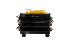 Black mobile tool cart with yellow top and multiple shelving compartments on wheels