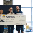 Three people holding a $10,000 NAPA Auto Parts donation check for Make a Wish Foundation on July 8, 2026
