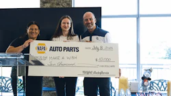 Three people holding a $10,000 NAPA Auto Parts donation check for Make a Wish Foundation on July 8, 2026