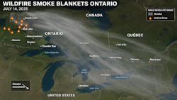 NASA satellite image showing wildfire smoke blankets across Ontario and Quebec on July 14, 2025, with active fire locations marked in orange.
