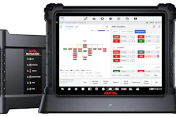 Autel MaxiSys diagnostic tablet displaying vehicle system topology and diagnostic parameters with handheld scanner unit