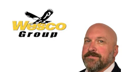Wesco Group logo featuring black eagle symbol above yellow and black text