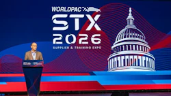 Speaker at podium presenting at WorldPac STX 2026 Supplier and Training Expo with Capitol building backdrop