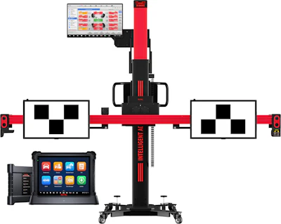 Professional wheel alignment diagnostic system with dual monitor displays, red and black frame, calibration targets, and digital control tablet.