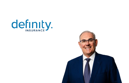 Professional headshot of male executive in dark suit and glasses with Definity Insurance branding