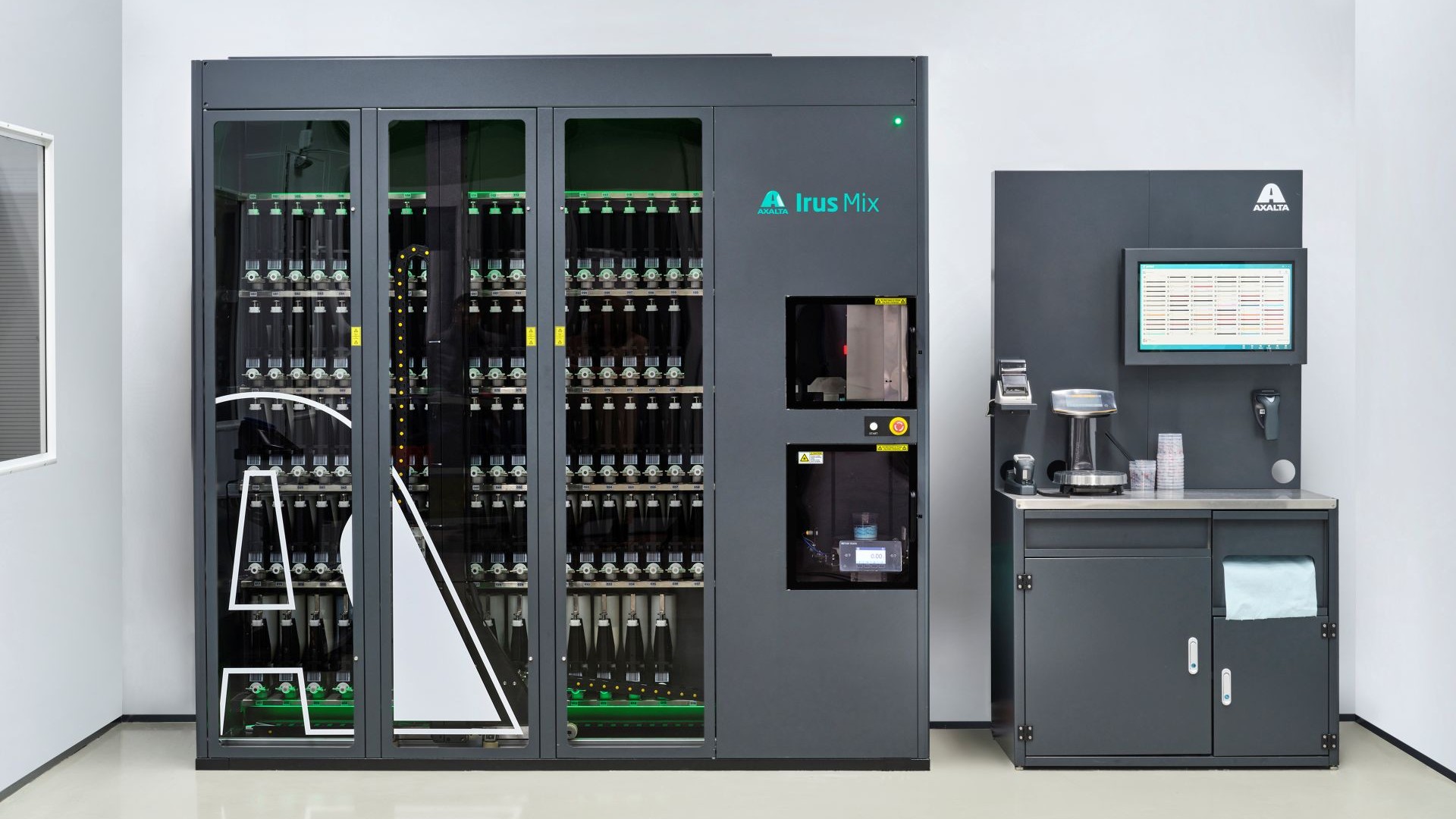 Irus Mix laboratory analyzer system with three glass-door cabinets containing modular components and a control station with monitor