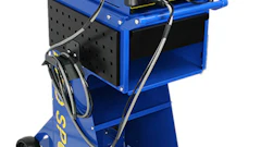 Blue portable welding machine mounted on mobile cart with control panel and equipment storage