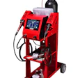 Red industrial welding machine with digital control panel, gas cylinder, and dual welding torches on wheeled cart