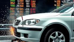 Silver SUV with dynamic water splash effect and stock market data displayed in background