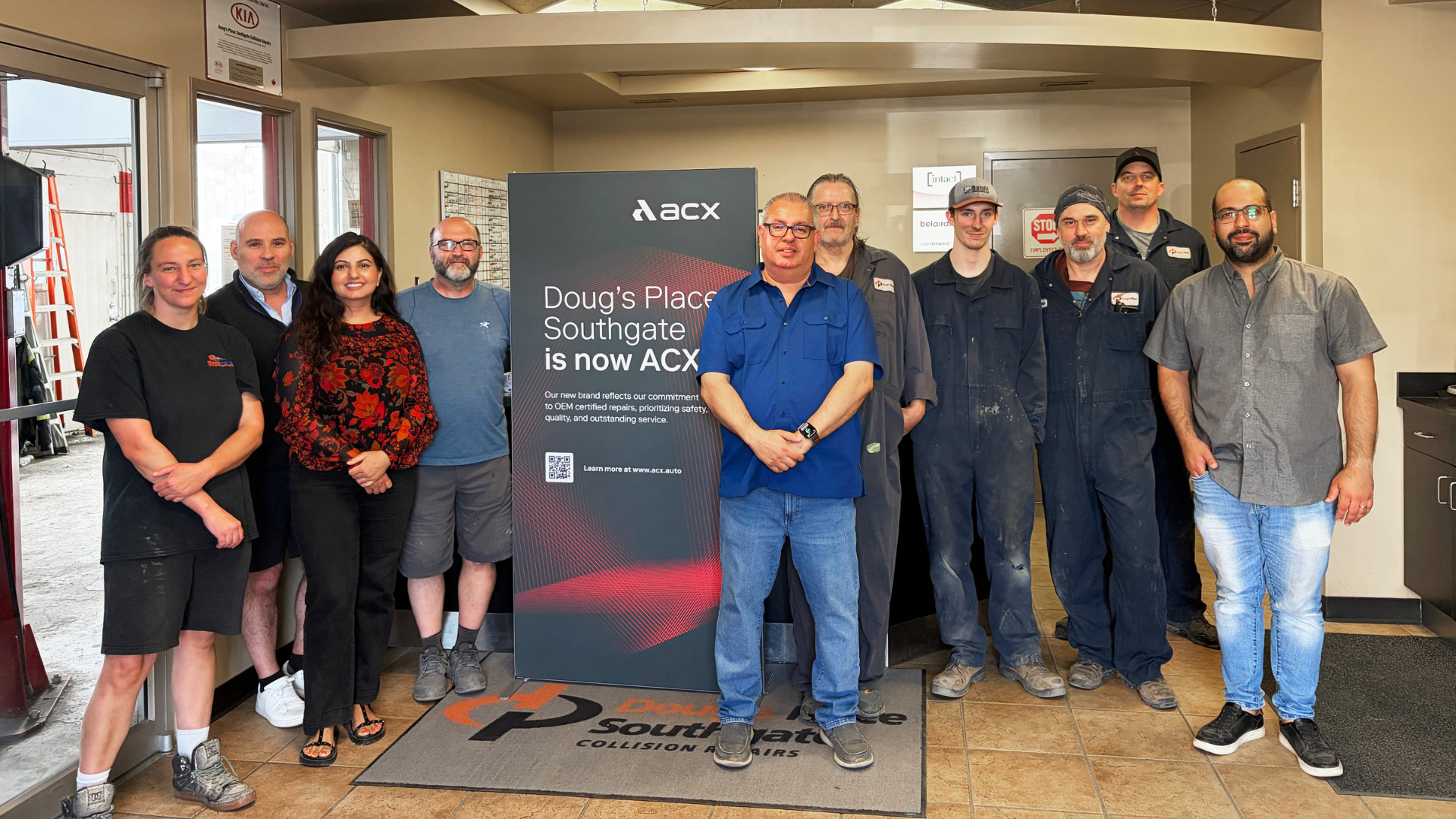 Team members pose together at ACX Southgate facility opening event
