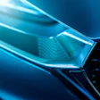 Abstract blue geometric shapes with glowing cyan edges and gradient lighting effects
