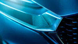 Abstract blue geometric shapes with glowing cyan edges and gradient lighting effects