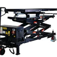 Black mobile scissor lift platform with hydraulic mechanism and control panel for elevated work access
