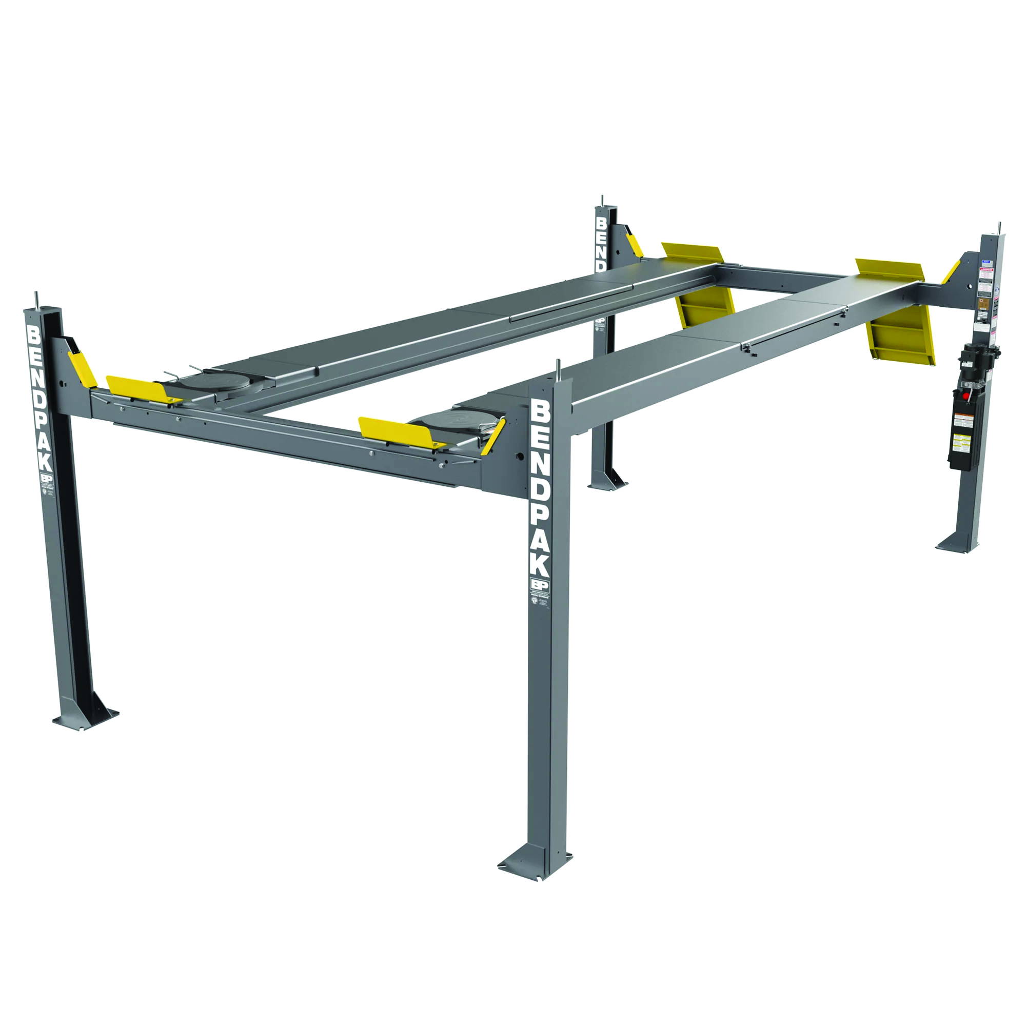 Bendpak four-post automotive lift with gray frame, yellow safety arms, and dual runway beams for vehicle service