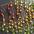 Colorful game pieces arranged in concentric circles with connecting lines representing organizational hierarchy or network structure
