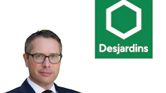 Professional man in glasses and business suit with Desjardins logo